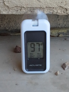 One of my cheap thermometers.  The high temp occurred during the cooler part of the day, when the sun was directly on it and raising it far above ambient!